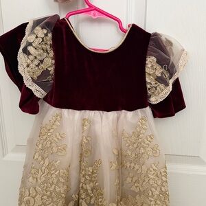 Elegant Burgundy and Gold Dress